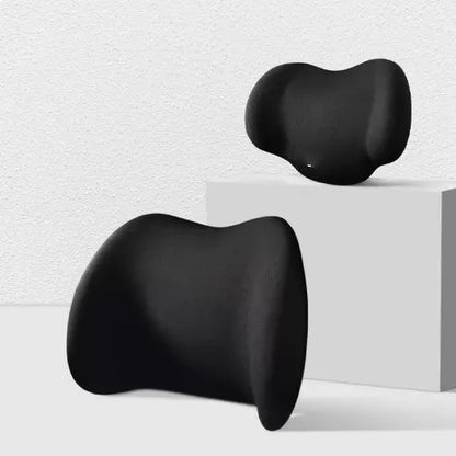 Black memory cotton car headrest cushion and matching lumbar support pillow on a car seat.
