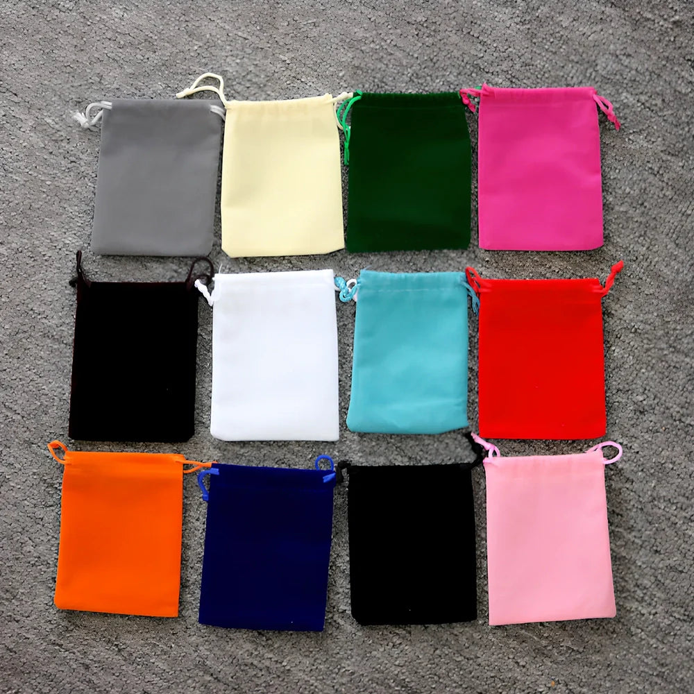 Multi-colour flannel jewellery storage bags in sizes 5x7cm to 20x30cm with gold drawstring and lining