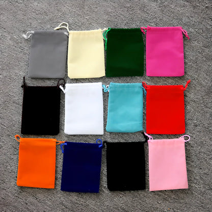 Multi-colour flannel jewellery storage bags in sizes 5x7cm to 20x30cm with gold drawstring and lining