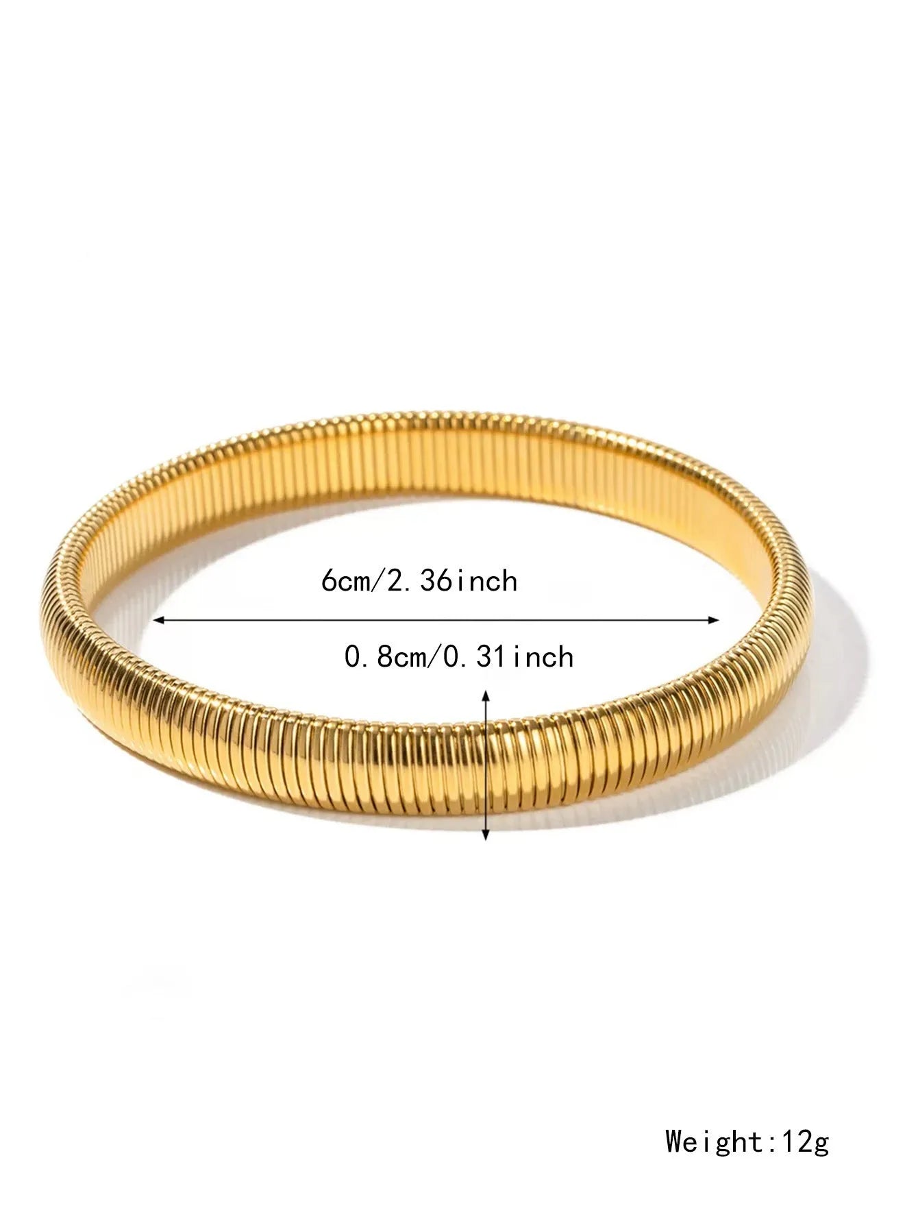 Women's titanium steel elastic bracelet with a vertical stripe pattern in gold, shown on a wrist.