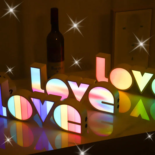 LED LOVE Light with rainbow-style lampshade and 'LOVE' word design, powered by batteries or USB