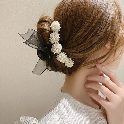 Korean pearl bow hair clip with alloy construction and handmade design