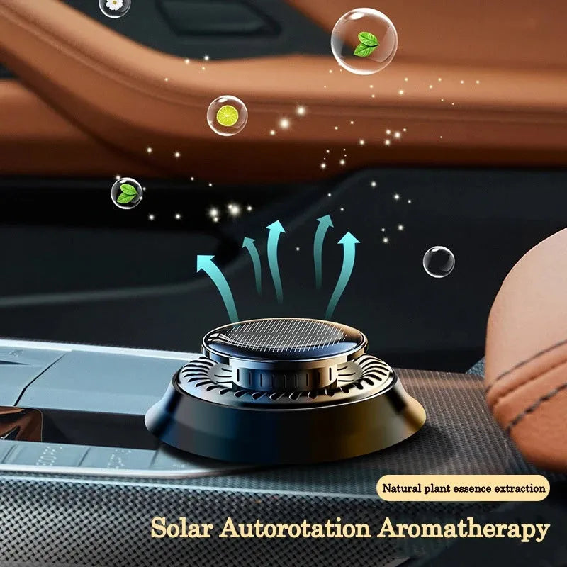 Solar powered kinetic car air freshener with rotating double rings in black colour options