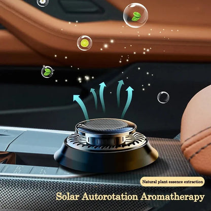 Solar powered kinetic car air freshener with rotating double rings in black colour options