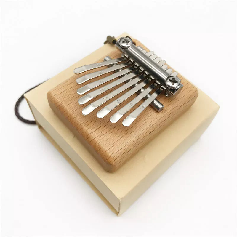 8-note mini thumb piano in beech wood, compact and portable musical instrument
