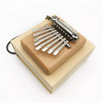 8-note mini thumb piano in beech wood, compact and portable musical instrument