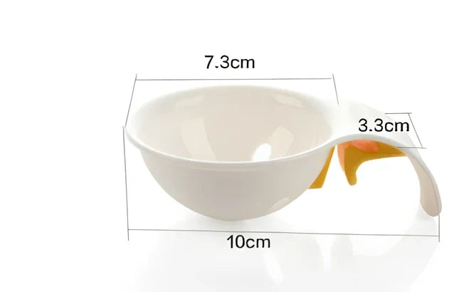 White ABS plastic egg separator with 10cm handle and 7.3cm bowl for yolk separation