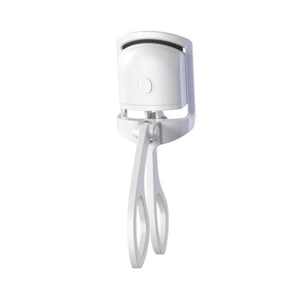 Pink heated electric eyelash curler with USB charging port and curved design with silicone pads