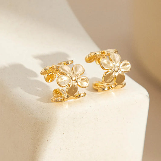Gold electroplated alloy earrings with starfish and conch design elements for women's beach fashion