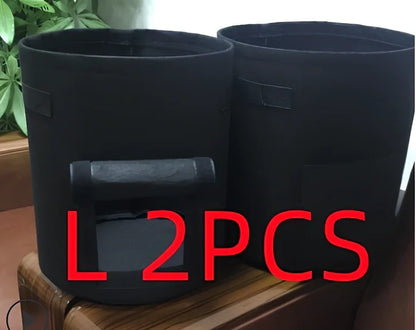 Black plant growth bag with side harvesting window and double handles for potato gardening