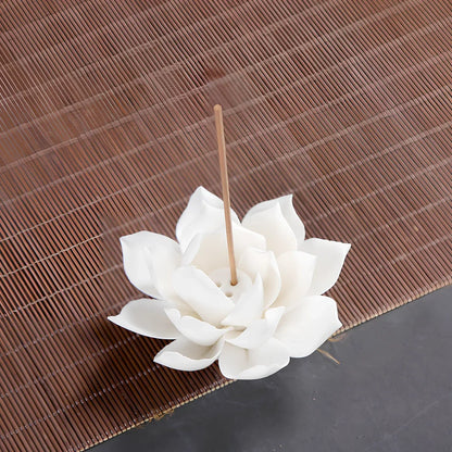 White porcelain lotus incense burner showing S and L size options with ceramic construction