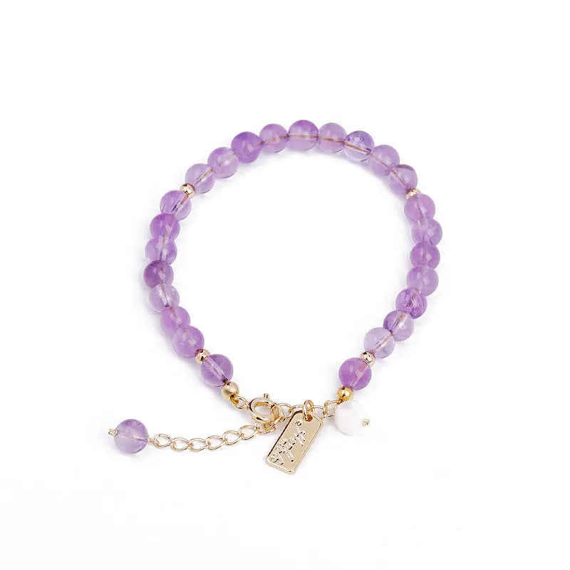 Women's natural crystal bracelet with lavender amethyst stones in dark and light colour options