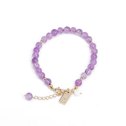 Women's natural crystal bracelet with lavender amethyst stones in dark and light colour options