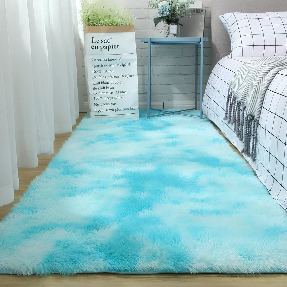 Tie-dyed variegated silk wool carpet floor mat showing organic colour patterns with polyester fibre suede backing