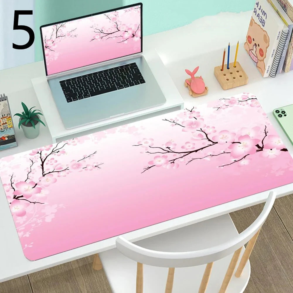 Large gaming mouse desk mat showing printed design on rubber surface with size options up to 400x900mm