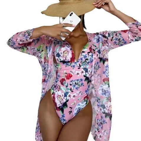 Women's floral print bikini three-piece swimsuit set with matching coat in a selection of colours.