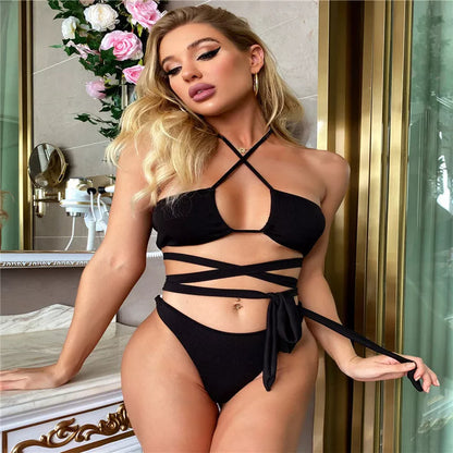 Strappy solid color bikini for women in black, featuring quick-drying polyester fabric.