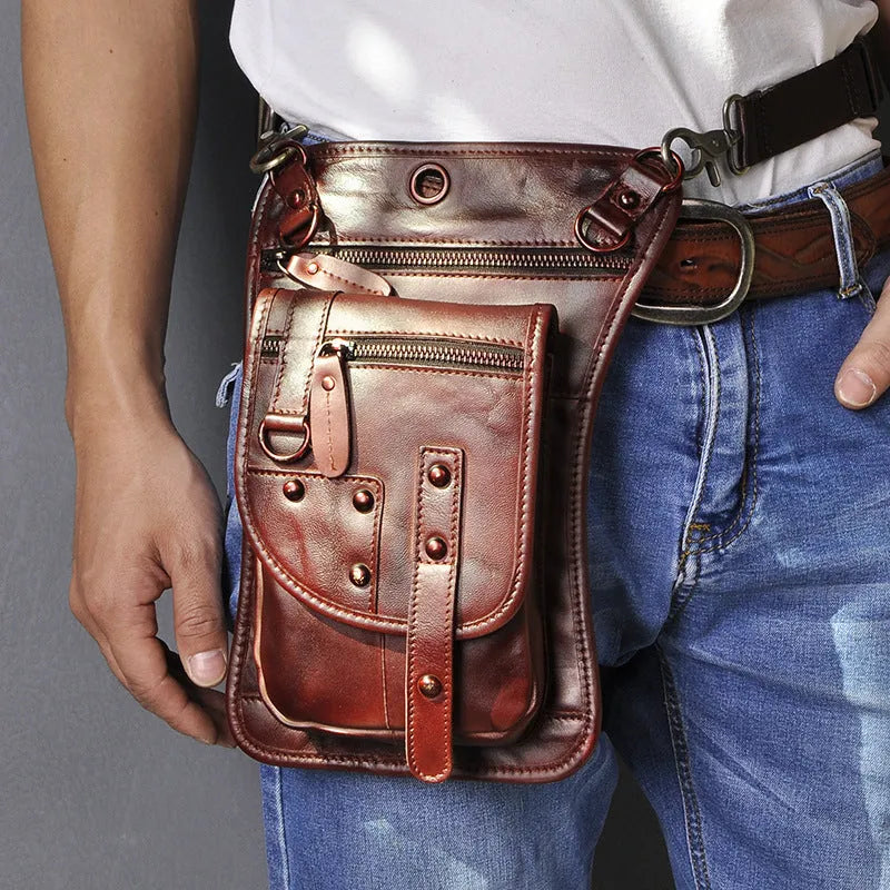 Men's black punk fanny pack with cowhide leather, zipper closure, and internal phone and ID compartments.