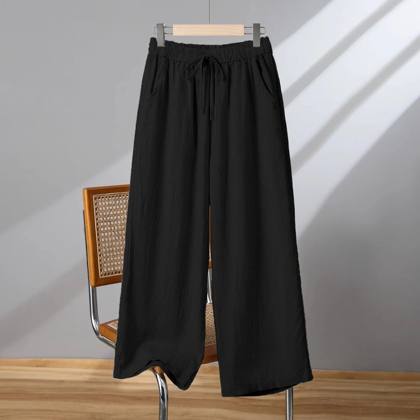 Women's straight-leg casual trousers with elastic waistband and drawstring closure in polyester fabric