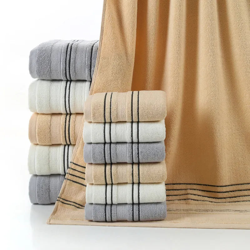 100% cotton bath towel set showing white, grey, and khaki colour options