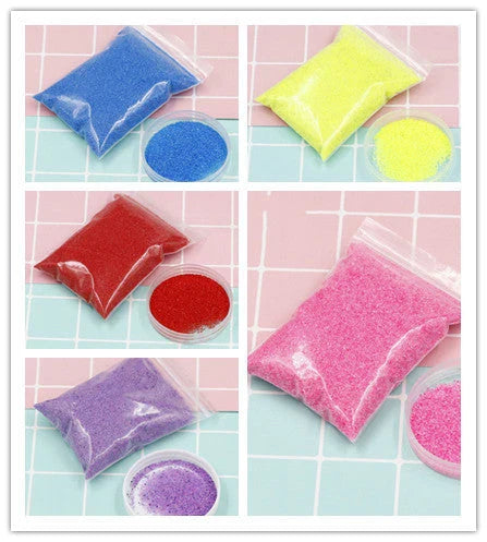 Magical self-adhesive space sand in various colors, allowing for endless creative sculpting and molding even when submerged in water