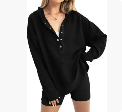 Women's loose raglan sleeve sweater in peacock green colour, showing long sleeves and casual pullover style