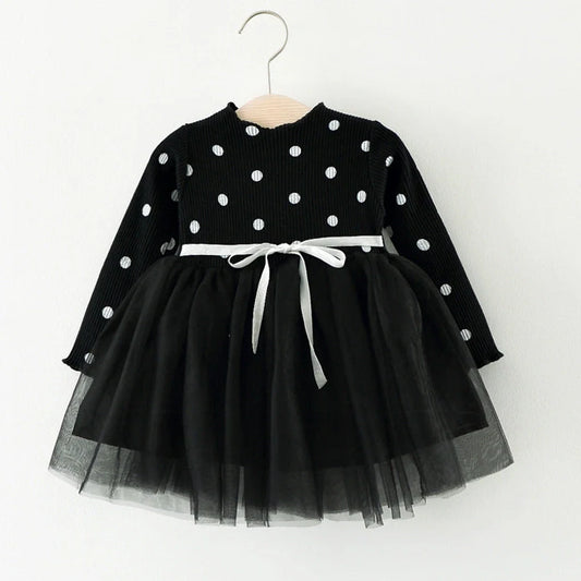 Baby girl wearing cotton long sleeved princess dress in pink colour