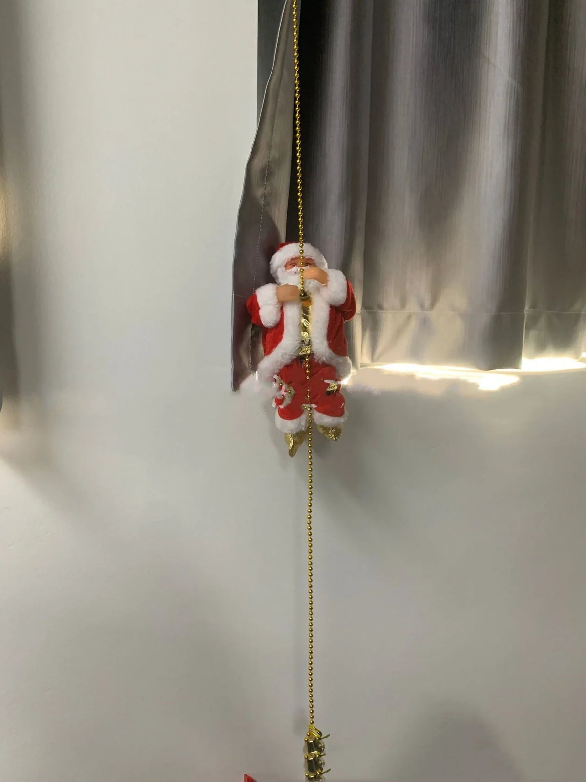 Electric plastic Santa Claus on 30cm climbing ladder with riding deer, in red suit, for Christmas decorations