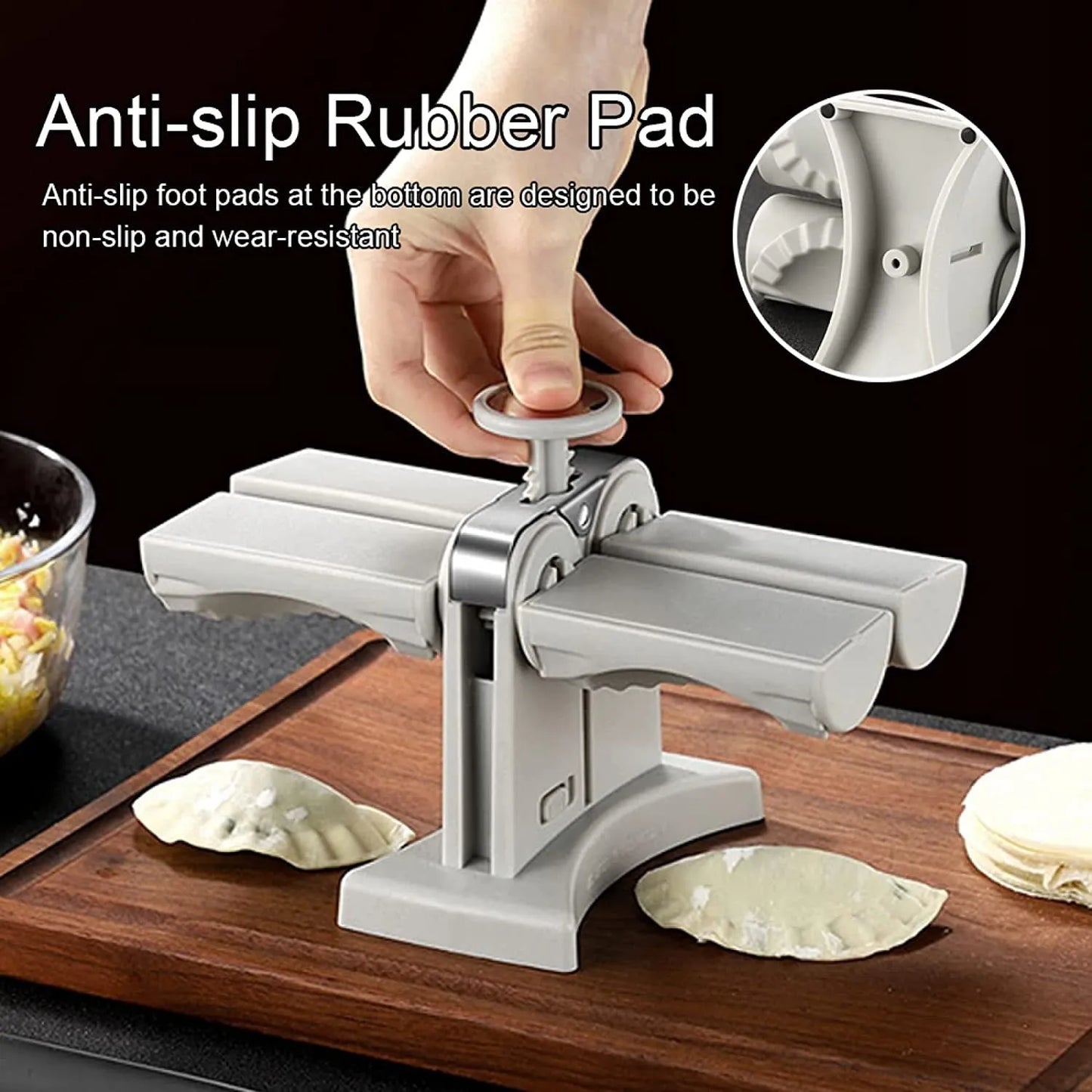 White double-head manual dumpling maker press on a kitchen counter