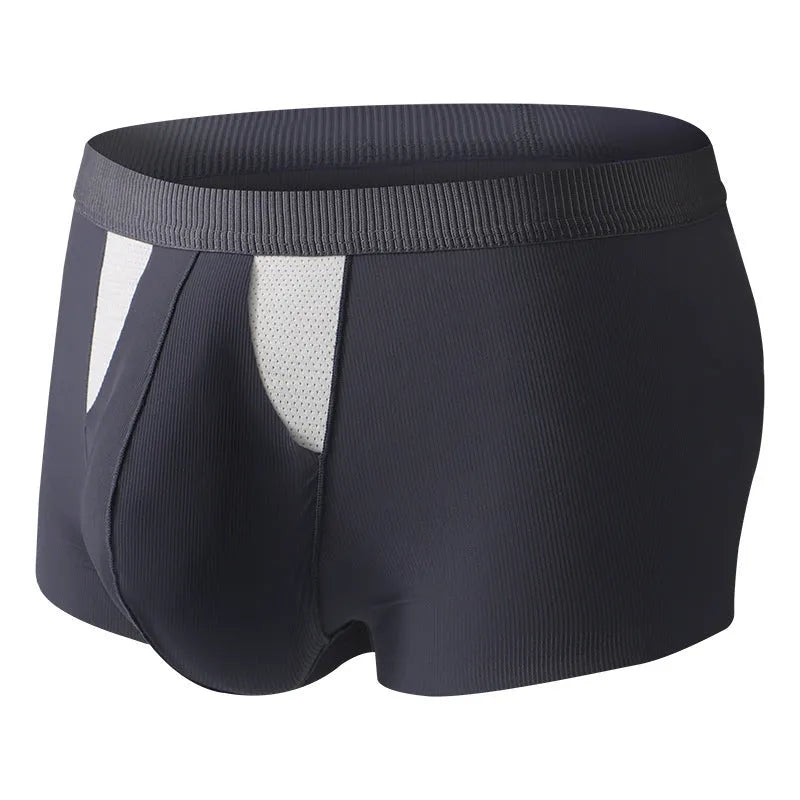 Man wearing black ice silk double-layer underwear shorts with a hole bag design for dry wet separation.