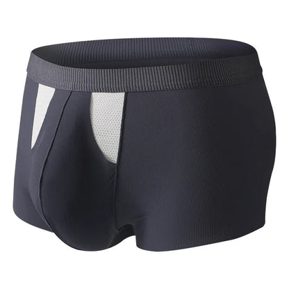 Man wearing black ice silk double-layer underwear shorts with a hole bag design for dry wet separation.