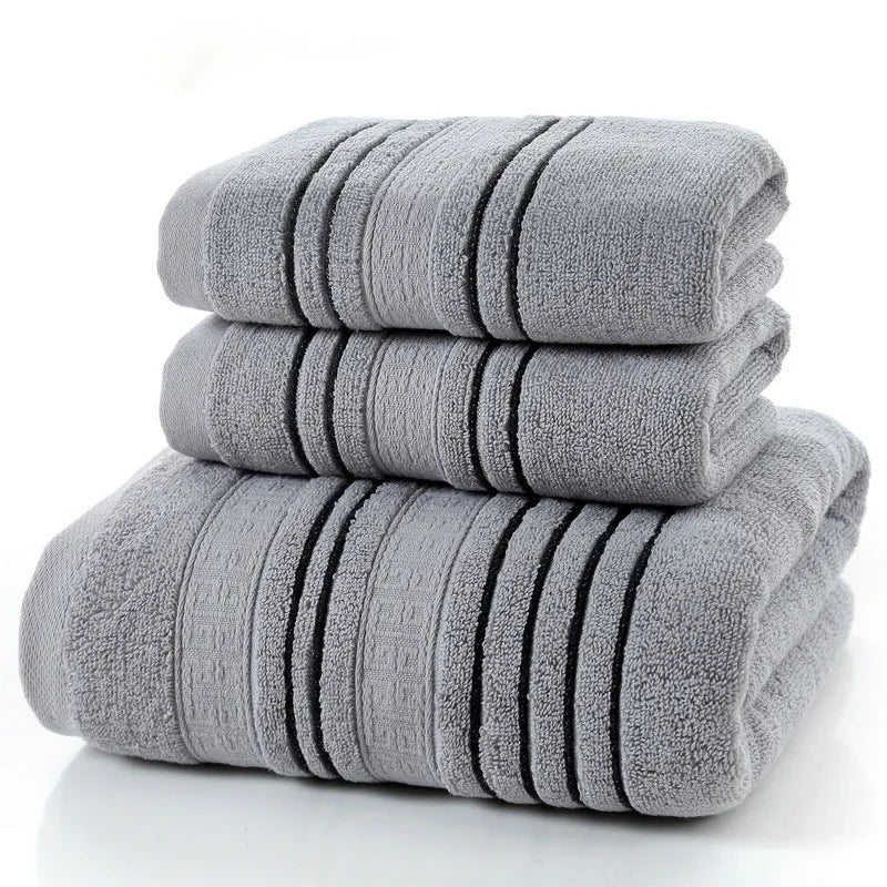 100% cotton bath towel set showing white, grey, and khaki colour options