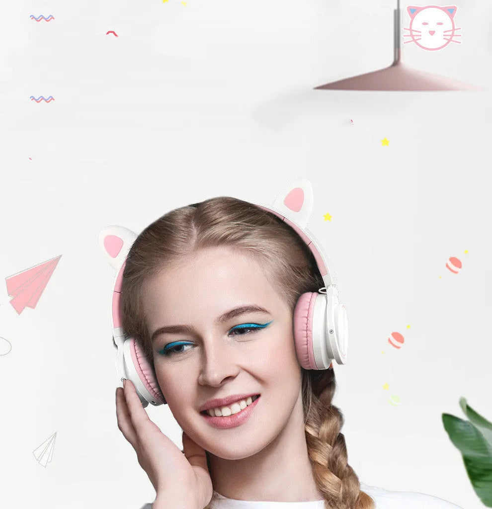 Pink and white wireless Bluetooth headset with 40mm speakers and braided cable