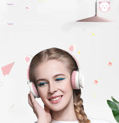 Pink and white wireless Bluetooth headset with 40mm speakers and braided cable