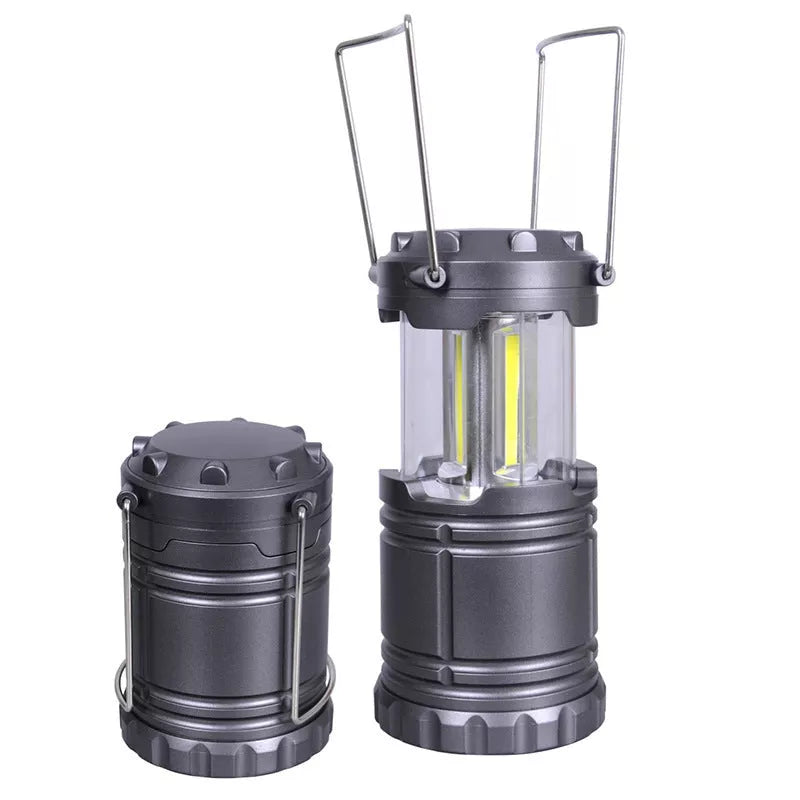 Solar-powered COB camping lamp with telescopic design and fold-away handles