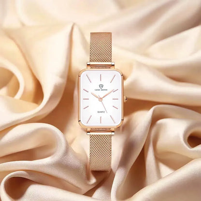 Women's waterproof quartz watch with rose gold alloy case and woven steel strap on wrist