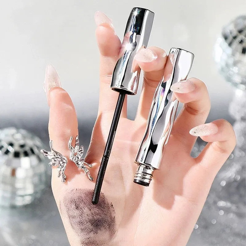 Waterproof mascara in steel tube with optional eyelash curler in black and brown colours