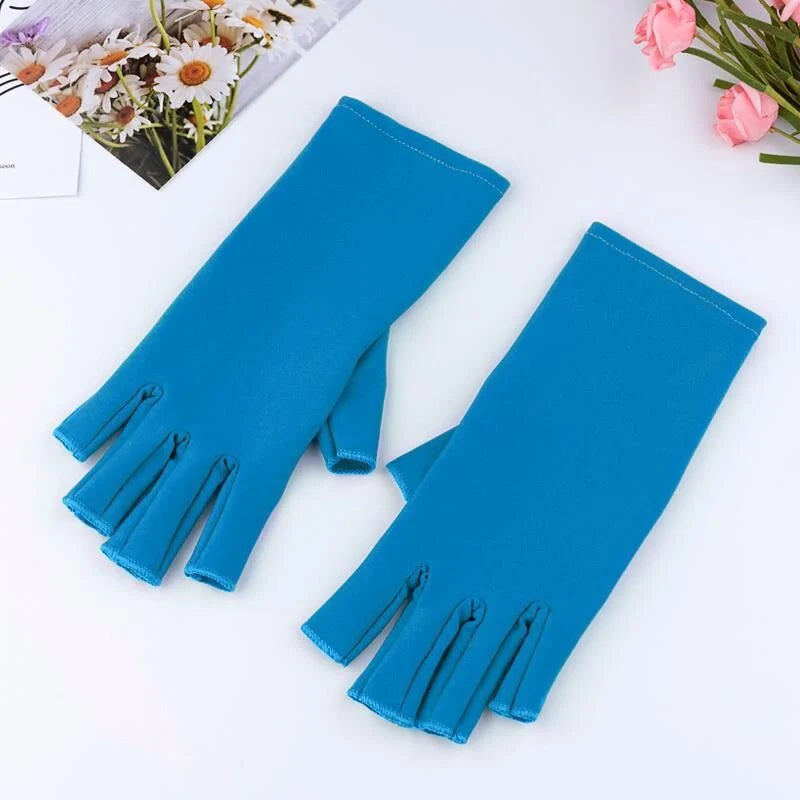 Manicure gloves with UV protection, featuring a stylish half-finger design and hand-painted finish for a comfortable and functional at-home nail care experience.