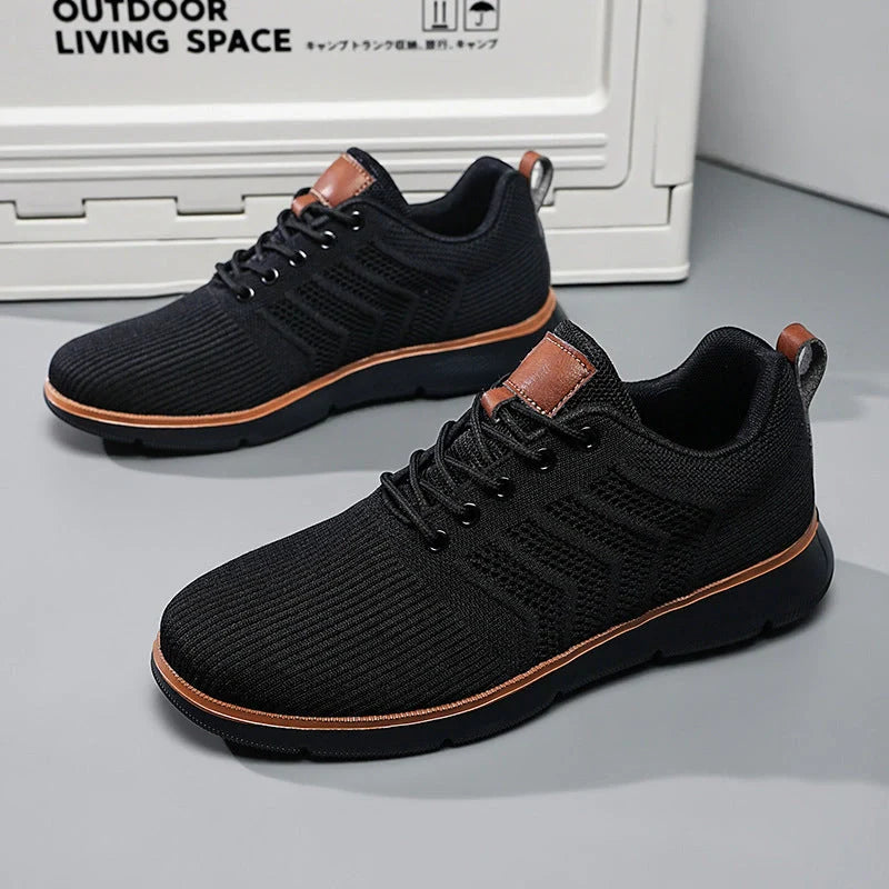 Men's black lace-up mesh sneakers with woven detail for casual and sports wear