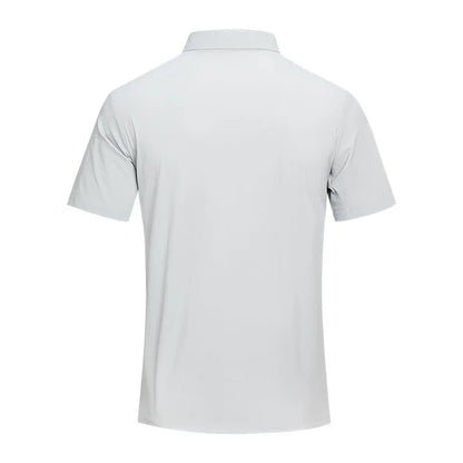 Man wearing a solid colour quick-dry polo shirt with short sleeves and a side slit detail.