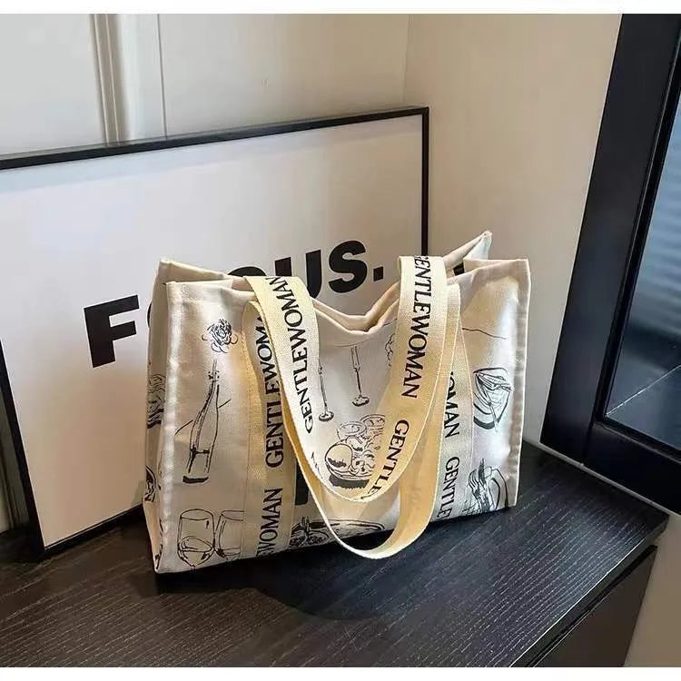 Canvas women's travel tote bag with printed patterns and shoulder straps