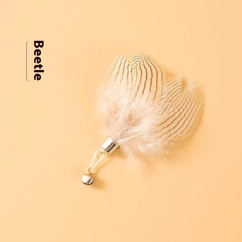 Three steel wire cat toy replacement heads with small flying insect designs in varied colours