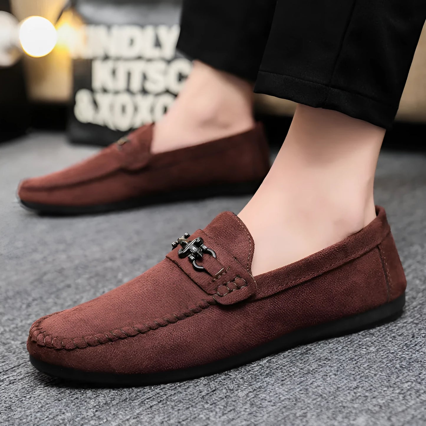 Men's black waterproof slip-on loafers with round toe and low stiletto heel on a rubber sole