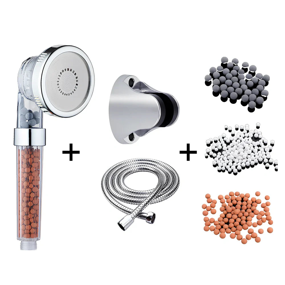 Pressurised shower head with stainless steel panel showing three water mode settings and removable nozzles