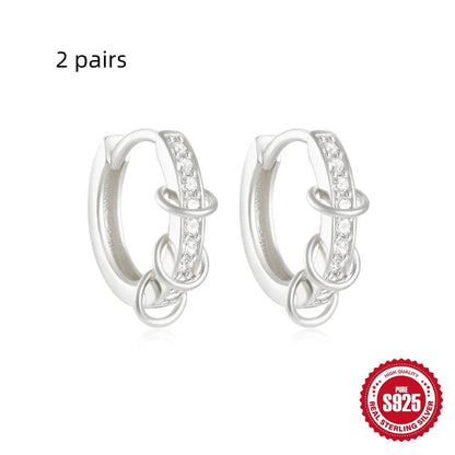 Sterling silver geometric stud earrings with small round diamond accents in gold or silver finish