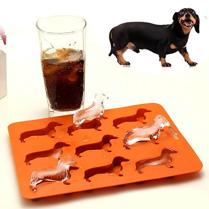 Orange silicone ice mould with 12 animal-shaped compartments for making decorative ice cubes