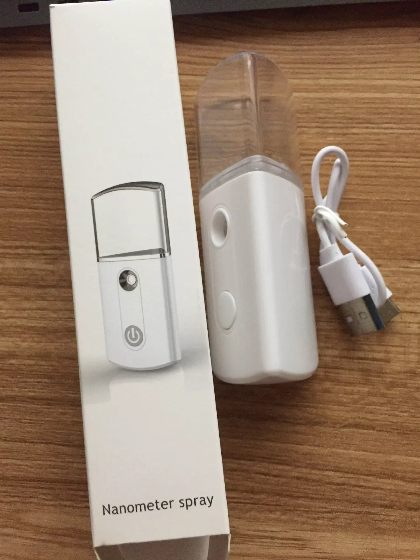 Portable Facial Nano Mist Humidifier in white, black, red, or pink