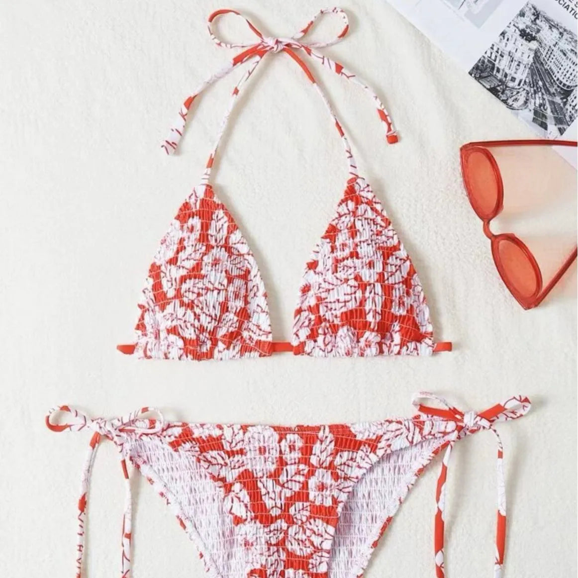 Women's floral halter neck swimsuit set in polyester fabric showing bra top and briefs