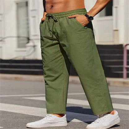 Men's straight-leg linen trousers in apricot colour with elastic waistband