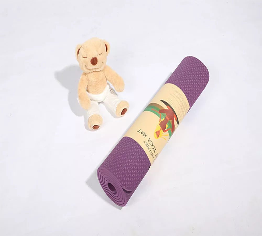 Firebird Beginner Yoga Mat in violet, blue, green, pink, or purple with 10mm thickness and non-slip surface